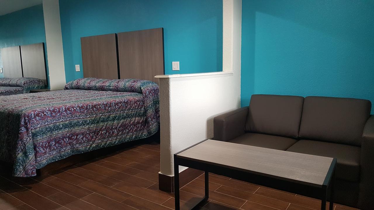 Moonlight Inn & Suites Jersey Village Quarto foto